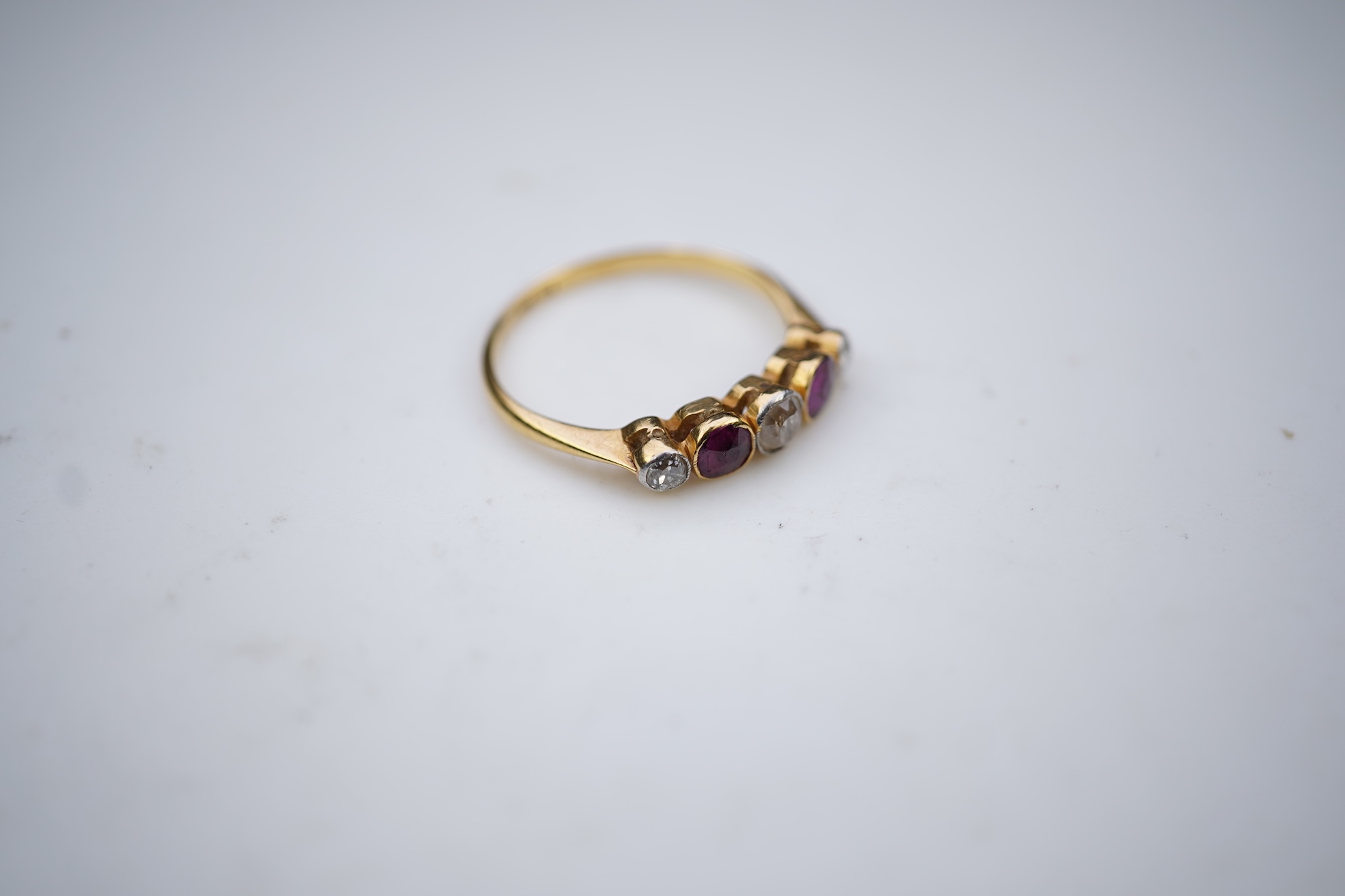 A ruby and diamond five-stone ring, early 20th century